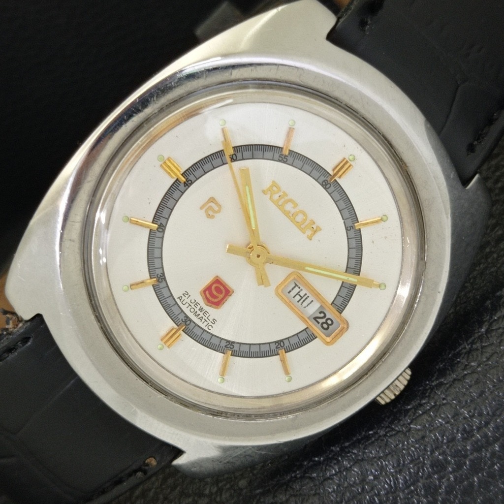 Vintage 1980 Ricoh Automatic Mens Silver Watch WDaydate  Gold Accents